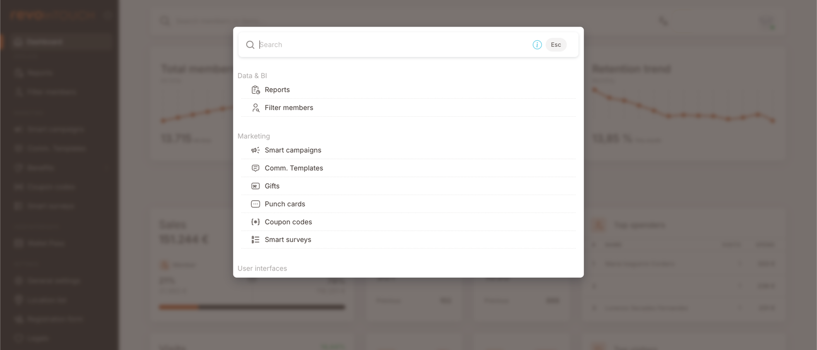 The quick-navigation palette overlay. Header reads "Search" with an Esc shortcut. Below: Data &amp; BI section (Reports, Filter members), Marketing section (Smart campaigns, Comm. Templates, Gifts, Punch cards, Coupon codes, Smart surveys), User Interfaces section (cut off below the fold).