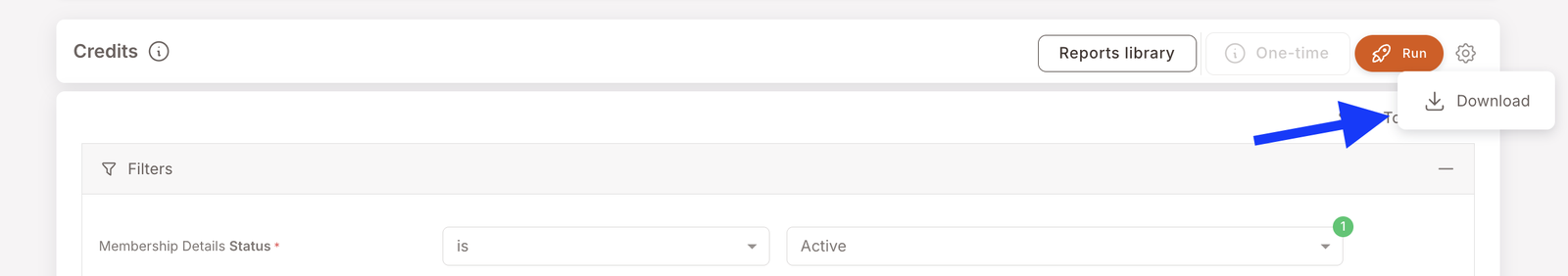 The Credits report header with a Download menu opened in the top-right. A blue arrow points up at the Download button, which sits in a small panel below the Reports library / One-time / Run / settings-gear row. The Download row has a download icon next to the word.